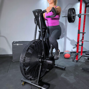 woman using air bike