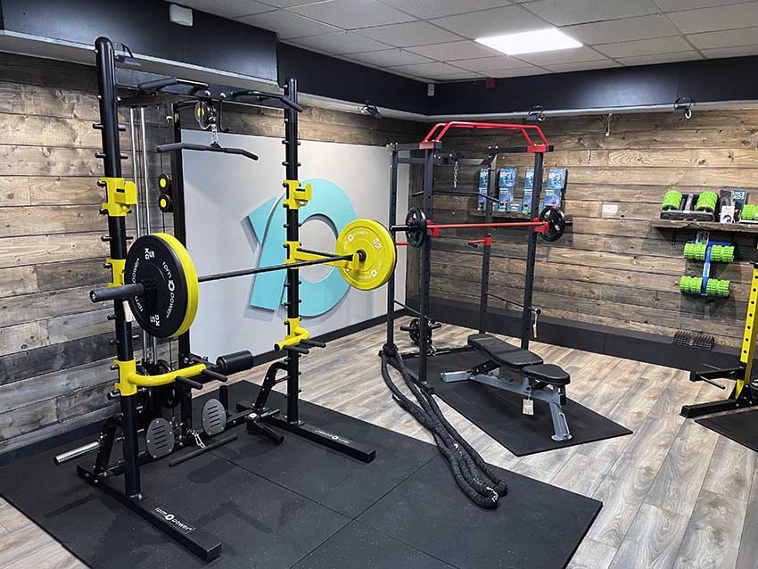 Half rack and a home gym rack on the shop floor of the RPM Power store in Thurles.