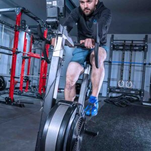 Man on BikeErg Spin Bike